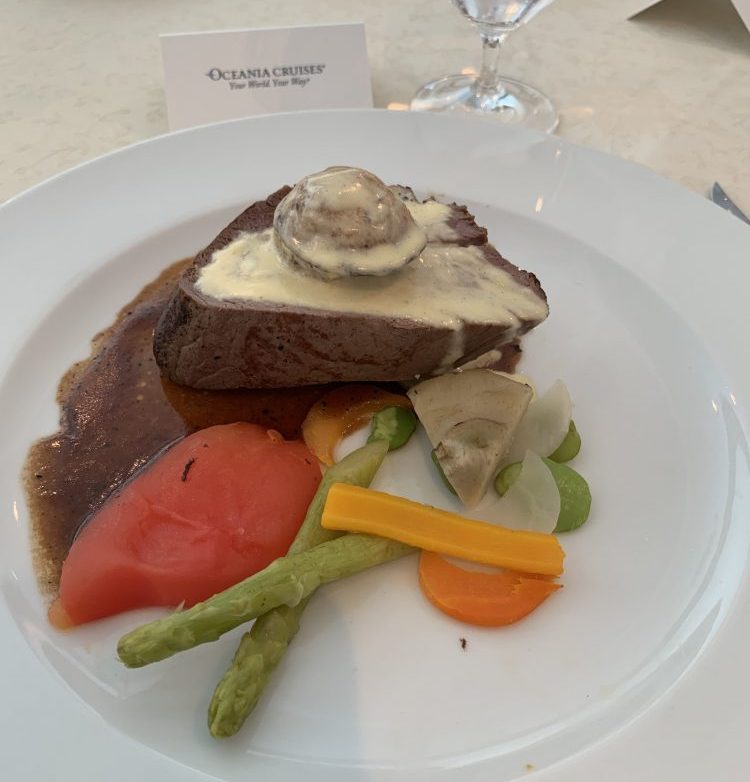 Filet De Boeuf Périgourdine (Medium Rare Roasted Beef Tenderloin with Black Truffle and Foie Agra’s Demi-Glacé, Harvest Vegetables and Glazed Mushrooms)