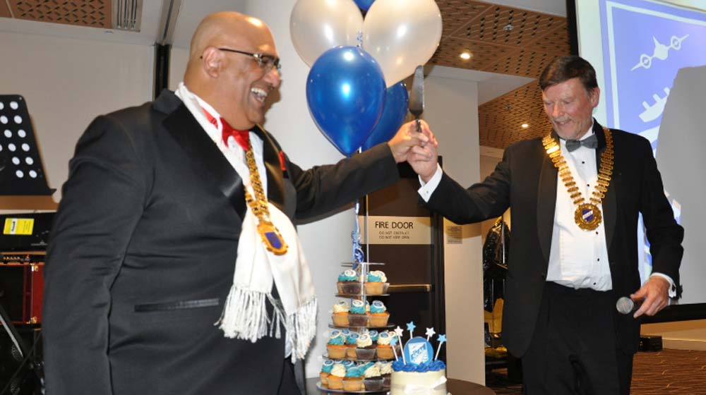 Walter Nand and Alfred Merse cake cutting