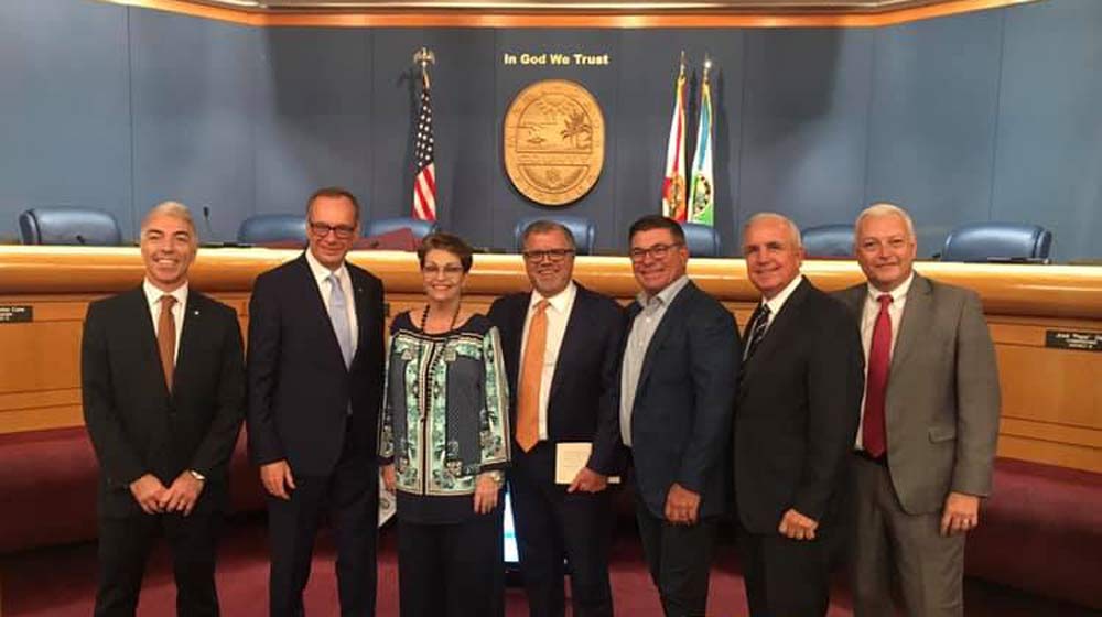 Miami-Cade County Mayor Carlos A. Gimenez (second from left) with PortMiami and cruise line executives.