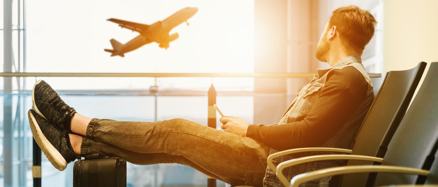 Man waiting for plane at airport